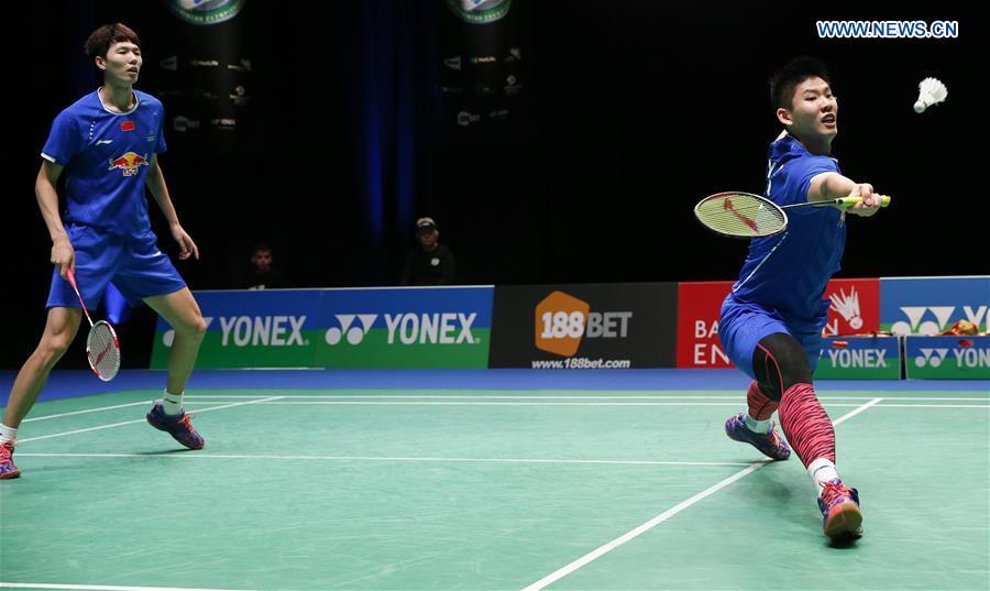 China's Li Junhui (L) / Liu Yuchen compete during the men's doubles first round match with Fajar Alfian/Muhammad Rian Ardianto of Indonesia at All England Open Badminton 2017 in Birmingham, Britain on Mar. 8, 2017.