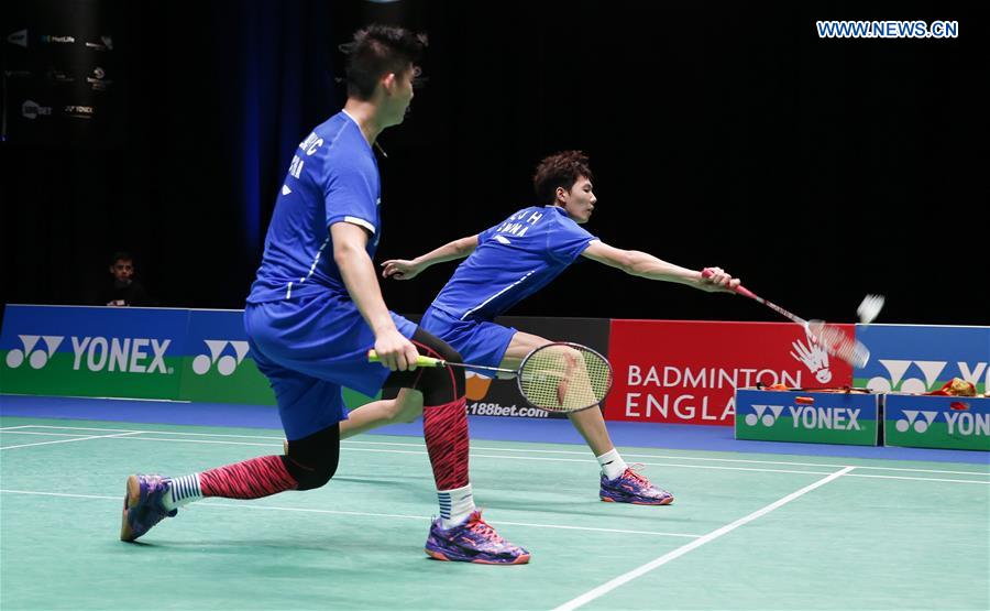 China's Li Junhui (R)/Liu Yuchen compete during the men's doubles first round match with Fajar Alfian/Muhammad Rian Ardianto of Indonesia at All England Open Badminton 2017 in Birmingham, Britain on Mar. 8, 2017.