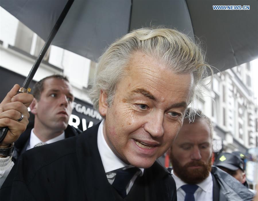 Leader of the right-wing Dutch populist Party for Freedom (PVV) Geert Wilders (Front) attends a campaign for the upcoming general elections in Breda, the Netherlands, on March 8, 2017.