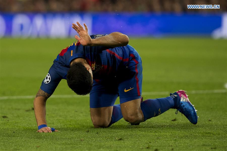 Luis Suarez of Barcelona reacts after losing a chance during the UEFA Champions League Round of 16 second leg match between Barcelona and Paris Saint-Germain in Barcelona, Spain on March 8, 2017. 