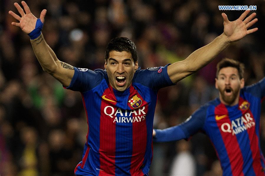 Luis Suarez (L) of Barcelona celebrates scoring during the UEFA Champions League Round of 16 second leg match between Barcelona and Paris Saint-Germain in Barcelona, Spain on March 8, 2017. 