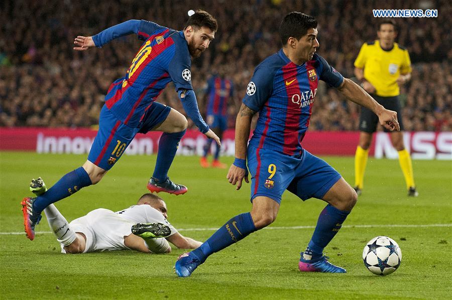 Luis Suarez(R) and Lionel Messi (L) of Barcelona attack during the UEFA Champions League Round of 16 second leg match between Barcelona and Paris Saint-Germain in Barcelona, Spain on March 8, 2017. 