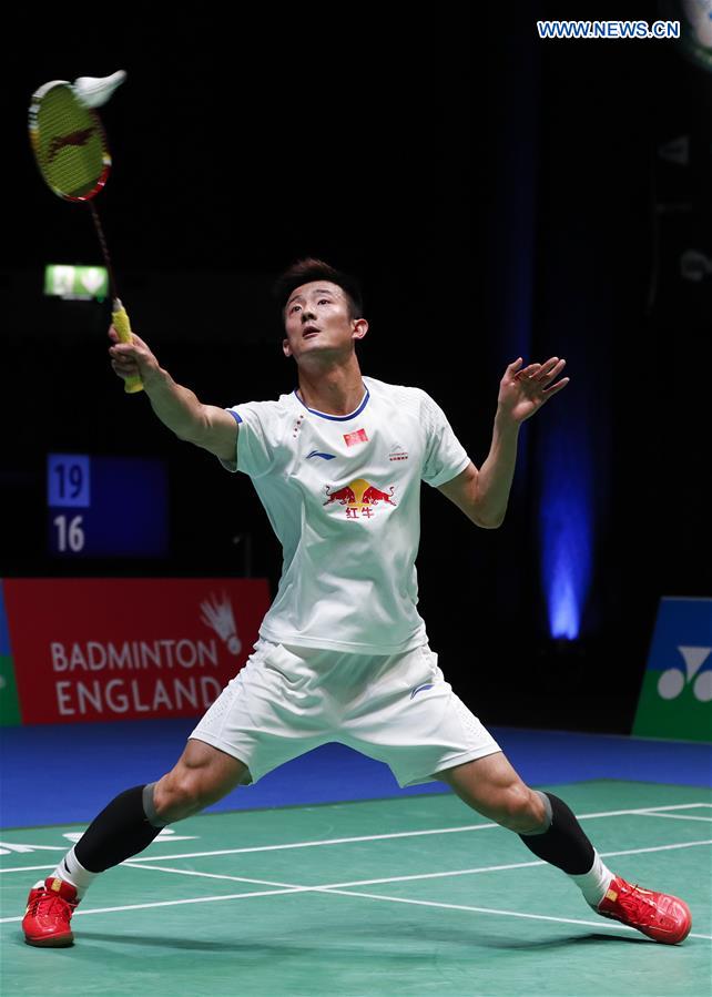 Chen Long of China returns the shuttlecock during the men's singles first round match with Marc Zwiebler of Germany at All England Open Badminton Tournament 2017 in Birmingham, Britain on March 8, 2017. 