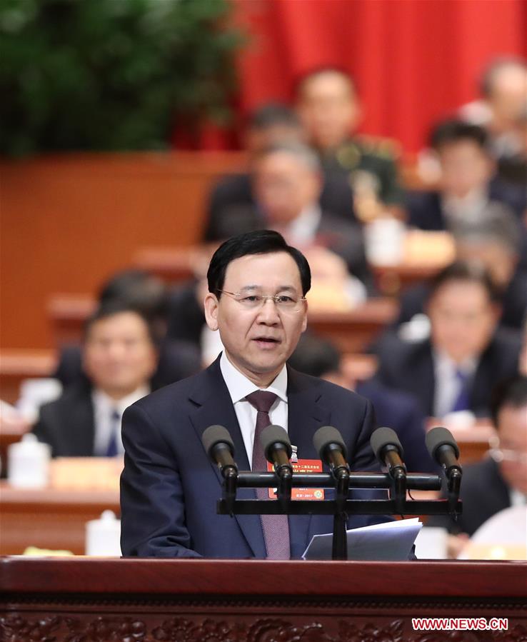 On behalf of the All-China Federation of Trade Unions, Li Shouzhen, a member of the 12th National Committee of the Chinese People's Political Consultative Conference (CPPCC), delivers a speech at the second plenary meeting of the fifth session of the 12th CPPCC National Committee in the Great Hall of the People in Beijing, capital of China, March 9, 2017. (Xinhua/Liu Weibing)