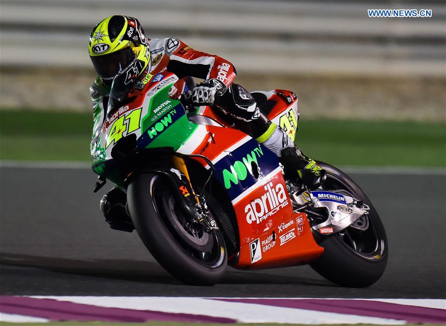 Spanish rider Aleix Espargaro of Aprilia Racing Team Gresini steers his bike during the pre-season test at the Losail International Circuit in Qatar's capital Doha on March 11, 2017, ahead of Grand Prix of Qatar which will be held from March 23 to 26.