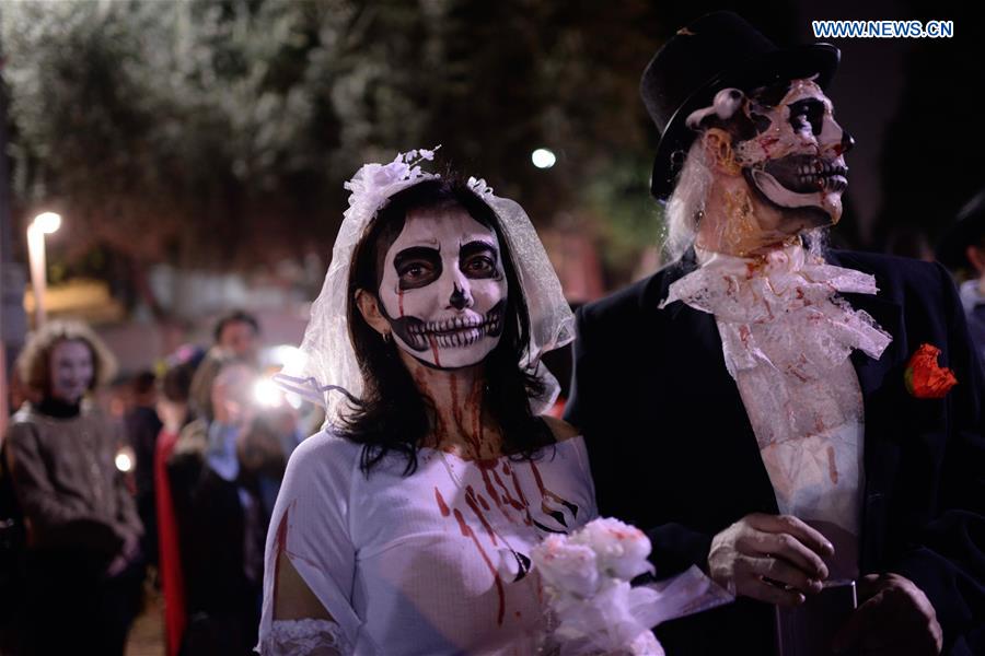 People take part in the 8th annual Zombie Walk in central Tel Aviv, Israel on March 11, 2017. 