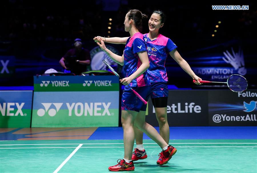 Chang Ye Na (R)/Lee So Hee of South Korea celebrate during the women's doubles final with Kamilla Rytter Juhl/Christinna Pedersen of Denmark at All England Open Badminton Championships 2017 in Birmingham, Britain on March 12, 2017.