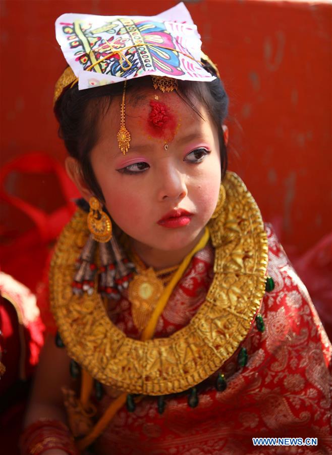 Little girls from Newar community attend a Bel Bibaha ceremony in Kavre,on the outskirts of Kathmandu,capital of Nepal, March 15, 2017. Bel Bibaha, or Ihi, is a marriage ceremony in the Newar community of Nepal in which pre-adolescent girls are 'married' to the bael fruit (wood apple). Normally Newar girls marry thrice in their life as first marriage with Bael fruit, second with sun and third with human.