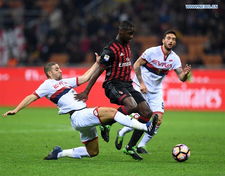 AC Milan's Christian Zapata (C) competes during a Serie A soccer match between AC Milan and Genoa, in Milan, Italy, March 18, 2017. 