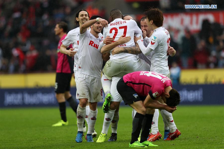 Players of 1. FC Koeln celebrate after scoring during the Bundesliga match between 1. FC Koeln and Hertha BSC in Cologne, Germany, on March 18, 2017. 