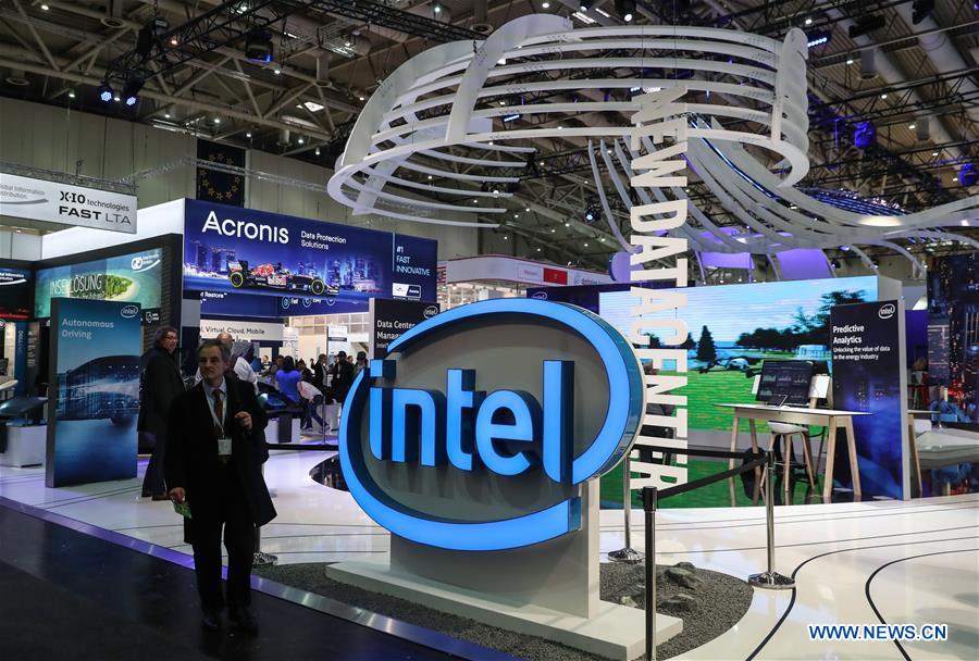 Photo taken on March 20, 2017 shows a view of the Intel booth during the CeBIT 2017 in Hanover, Germany. The world's leading trade fair showcasing IT and communications products and solutions CeBIT 2017 kicked off on Monday and will last until March 24. The show with the theme 'd!conomy - no limits' this year attracted around 3,000 exhibitors from 70 countries and regions and is expected to attract some 200,000 visitors. (Xinhua/Shan Yuqi) 