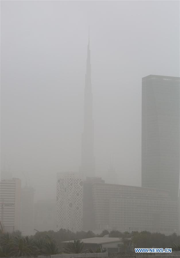 The skyscraper Burj Khalifa is seen through dust storm in Dubai, United Arab Emirates, March 20, 2017.