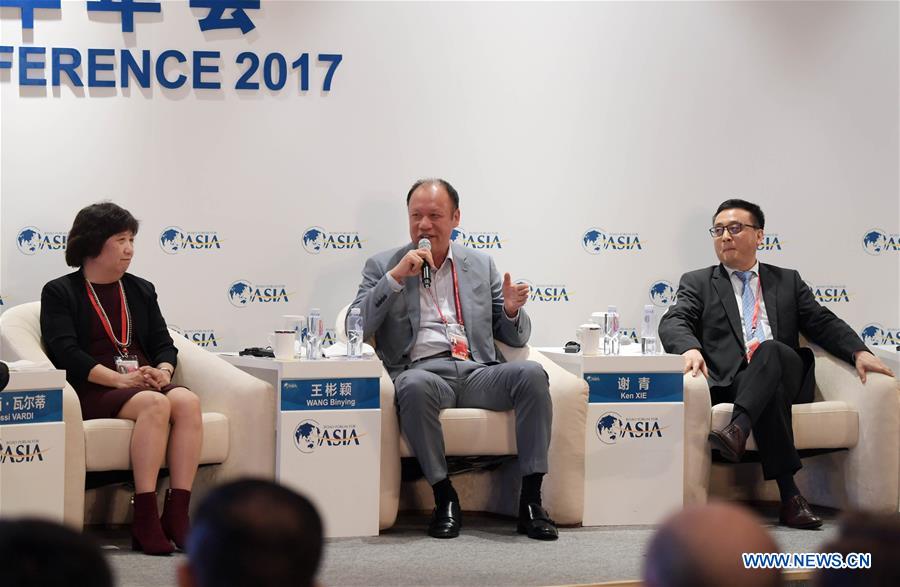 Ken Xie (C), founder, president and CEO of U.S. network security company Fortinet, addresses the session of 'The Innovators' DNA' at the Boao Forum for Asia Annual Conference 2017 in Boao, south China's Hainan Province, March 23, 2017. 