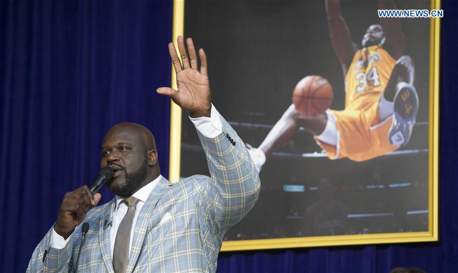 Los Angeles Lakers former center Shaquille O'Neal speaks during the ceremony to unveil his statue at Staples Center in Los Angeles, the United States, March 24, 2017. 