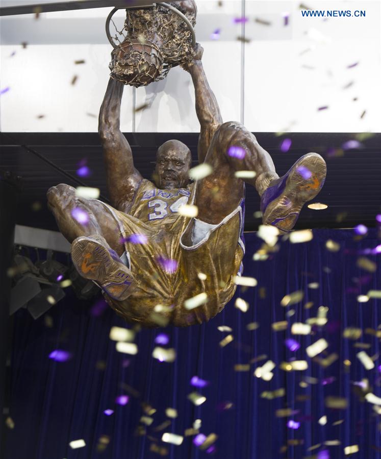 The statue of Los Angeles Lakers former center Shaquille O'Neal is unveiled at Staples Center in Los Angeles, the United States, March 24, 2017.