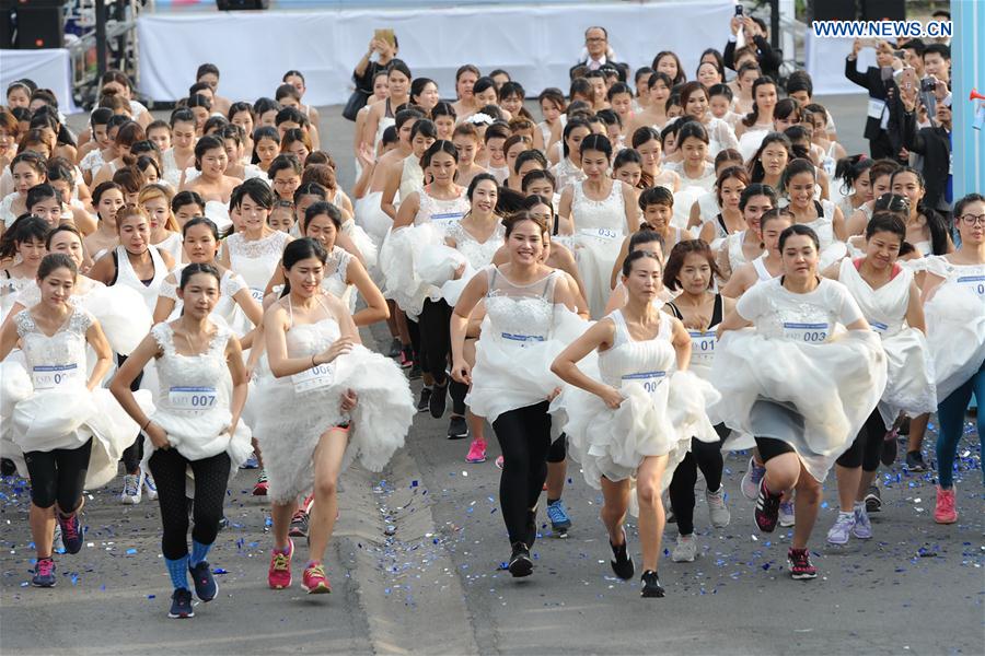 Brides-to-be compete in the 'EAZY Running of the Brides' contest in Bangkok, Thailand, March 25, 2017. 