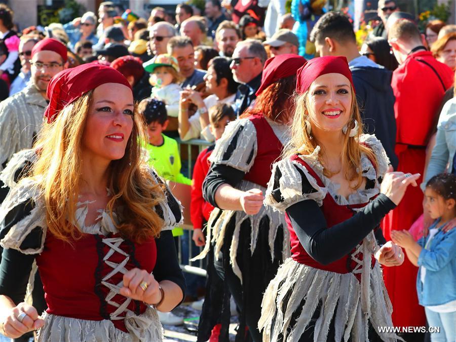 Revellers are seen during the cavalcade of Petange in Luxembourg, March 26, 2017.