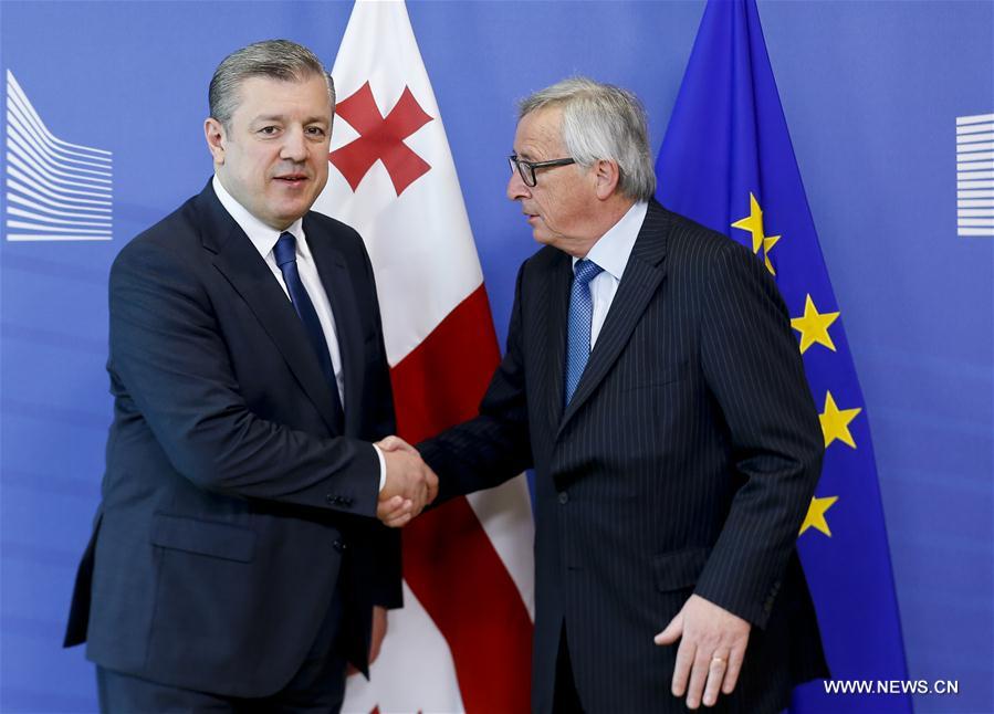 European Commission President Jean-Claude Juncker (R) meets with the visiting Prime Minister of Georgia Giorgi Kvirikashvili at EU headquarters in Brussels, Belgium, March 28, 2017. (Xinhua/Ye Pingfan) 