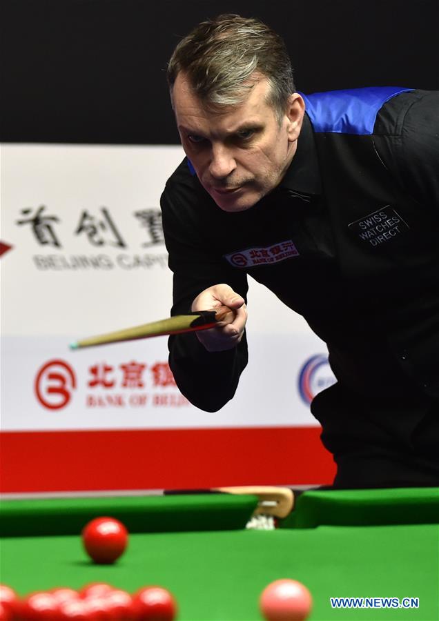 Mark Davis of England gestures during the second round match of 2017 World Snooker China Open Tournament against John Higgins of Scotland in Beijing, capital of China, March 29, 2017. Mark Davis lost 2-5. 