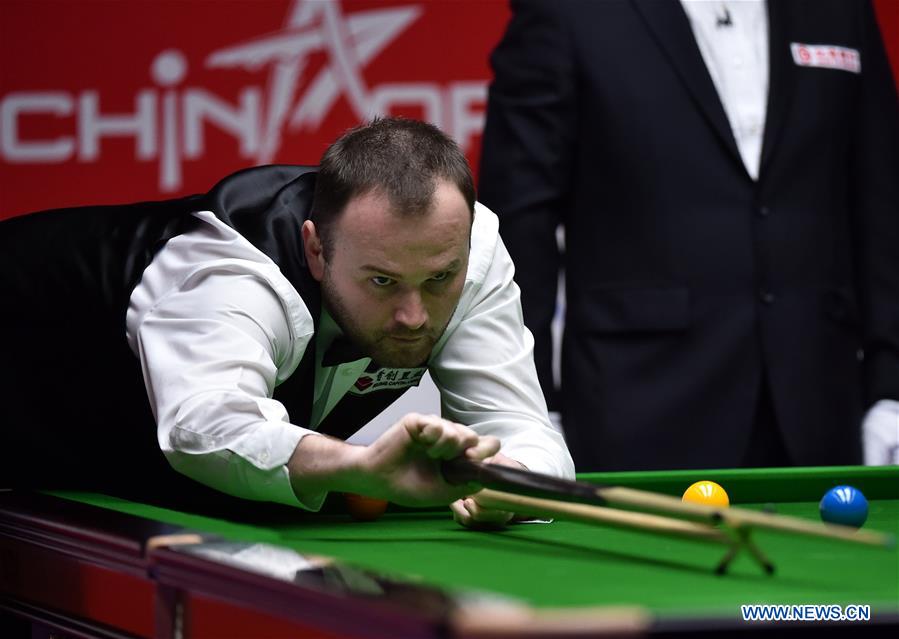 Mark Joyce of England competes during the second round match of 2017 World Snooker China Open Tournament against his compatriot Ronnie O'Sullivan in Beijing, capital of China, March 29, 2017. Mark Joyce won by 5-4. (Xinhua/Zhang Chenlin) 