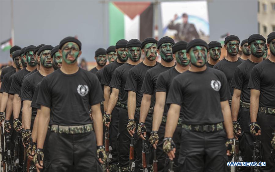 Members of the Palestinian Hamas security forces show their skills as they take part in a military graduation ceremony in Gaza City on March 30, 2017. (Xinhua/Wissam Nassar) 