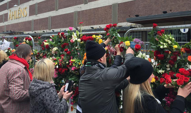 People pay tribute to victims of Stockholm truck attack