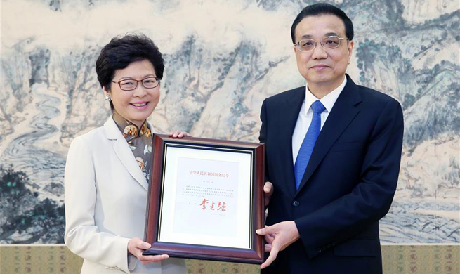 Premier Li grants appointment certificate to Lam Cheng Yuet-ngor as HKSAR chief executive