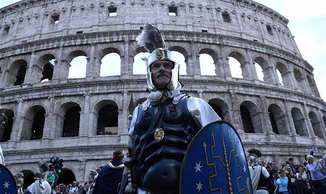 Performers take part in parade to celebrate Birth of Rome