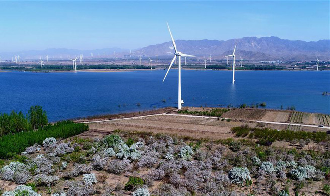 In pics: Wind power generation project in north China