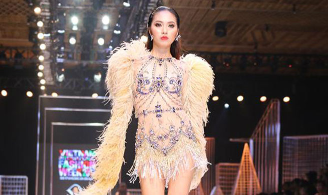 Models present creations at Vietnam Int'l Fashion Week