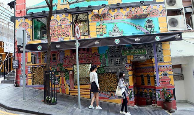 Tourists tour streets in China's Hong Kong
