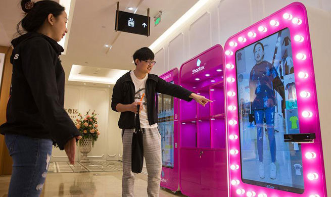 Virtual fitting room seen in Nanjing's shopping mall