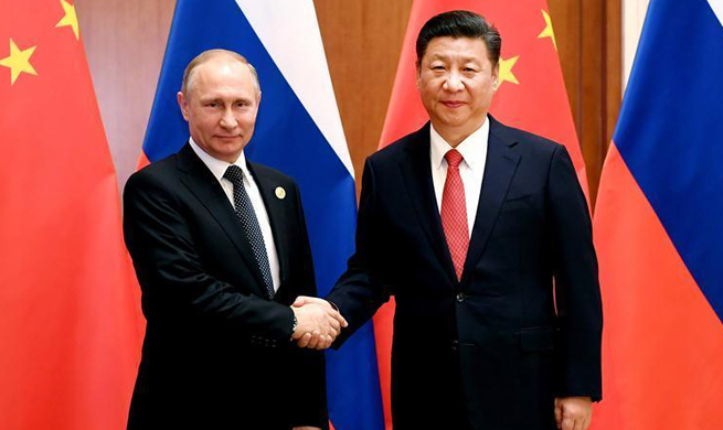 Xi says China, Russia play role of "ballast stone" in world 
peace, stability