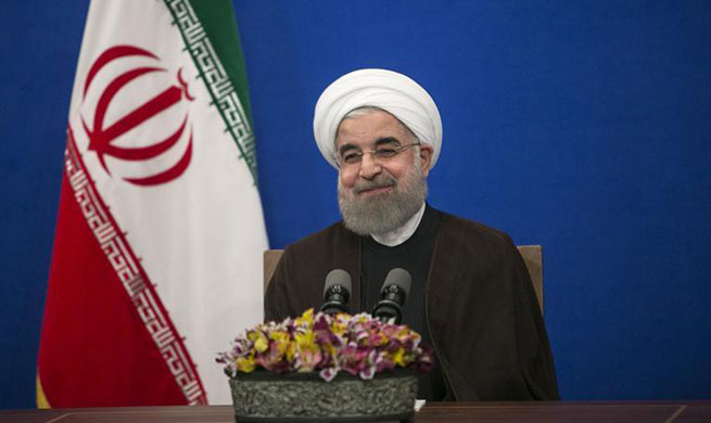 Rouhani wins Iran's presidential election with 57 pct of ballots