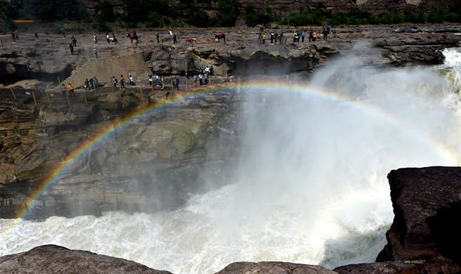 In pics: Hukou Waterfall of Yellow River in N China