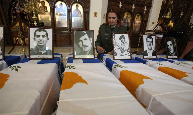 Cyprus hands remains of fallen Greek soldiers to relatives 43 years after their death
