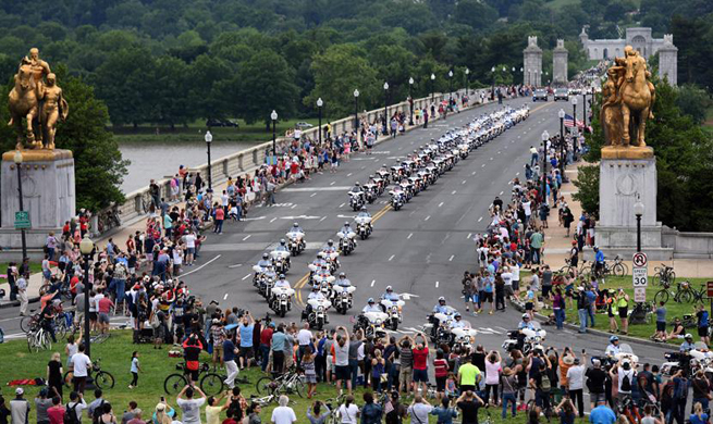 U.S. motorcyclists participate in Rolling Thunder motorcycle ride