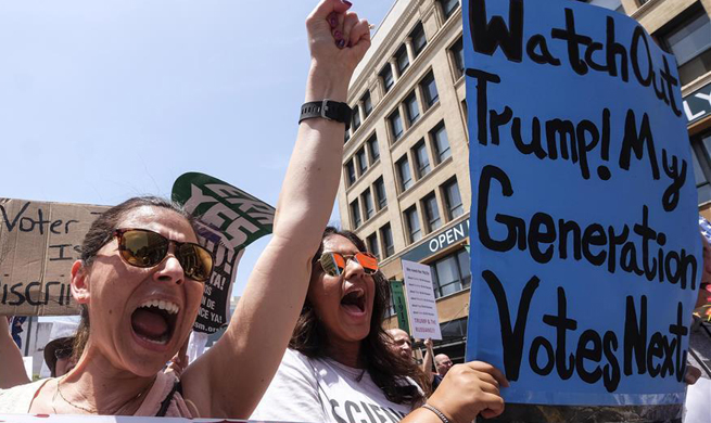 People participate in March for Truth rally in Los Angeles
