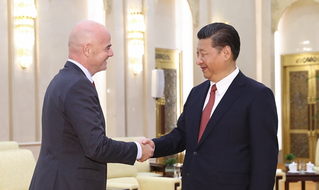 Xi meets with FIFA president Infantino
