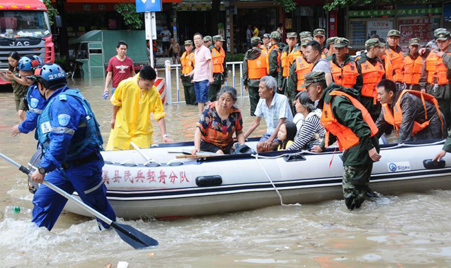 People displaced after continuous heavy rain in C China