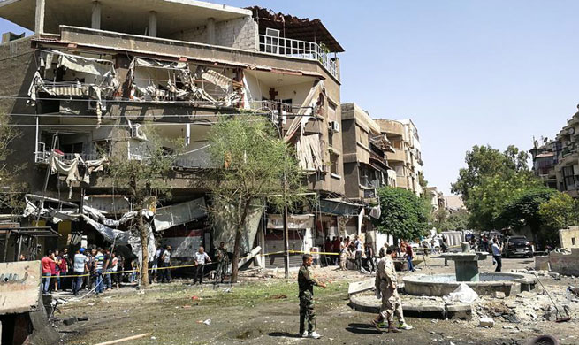 Triple bombings  rock Syria's Damascus