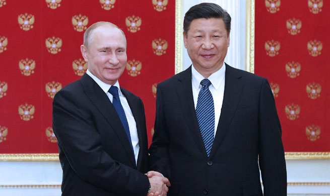 Xi, Putin agree to boost coordination on major issues