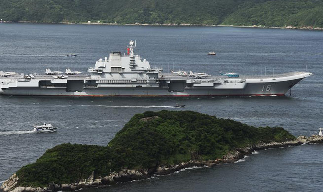 Aircraft carrier "Liaoning" sails near Lamma Island in HK