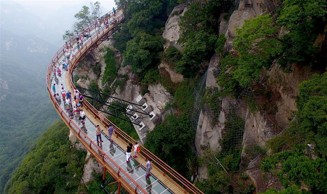 Scenery of plank road on cliff of Shaohua Mountain in NW China