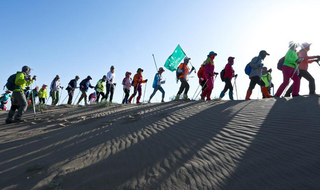 10 kilometer desert hiking challenge competition held in Zhangye, NW China