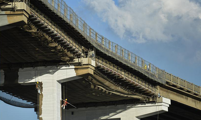 Workers renovate Nanjing Yangtze River Bridge in east China