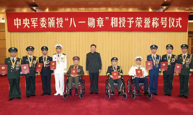 Xi honors military officers, unit ahead of Army Day