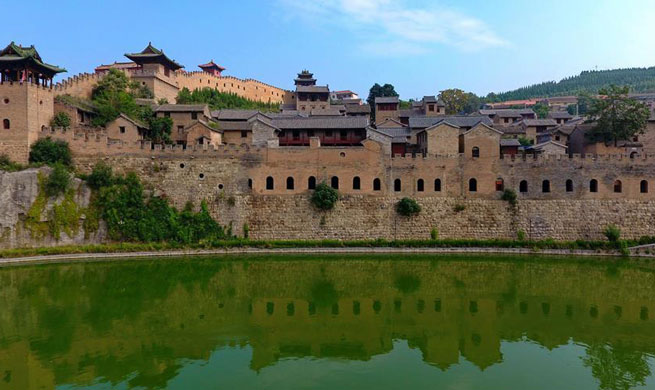 Old castle attracts tourists in China's Shanxi