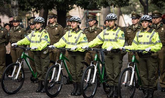 China donates bicycles for local police patrols in Santiago, Chile