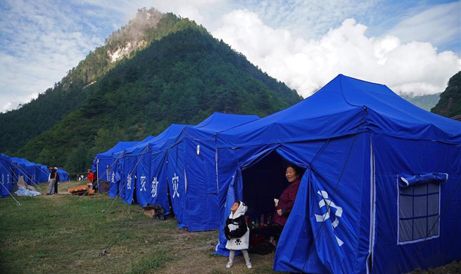 Quake-affected people start lives in tents in China's Sichuan